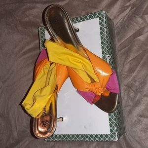 Slightly worn multi-color, stretch slingback shoes